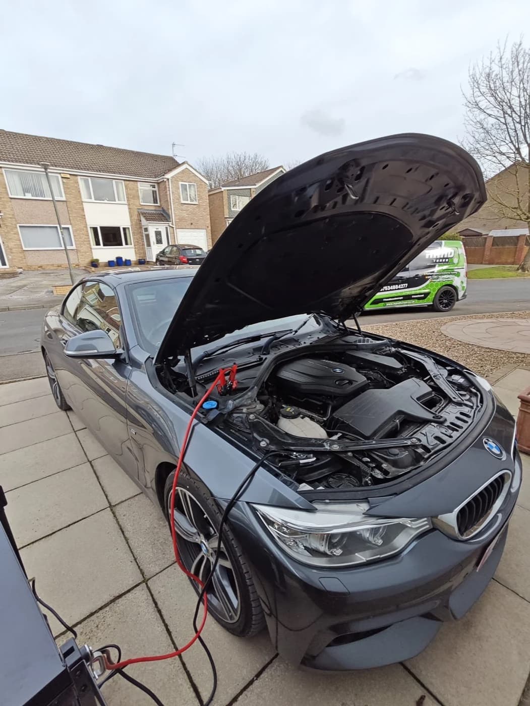 Hand Tuned running diagnostics on a BMW at the customer's home